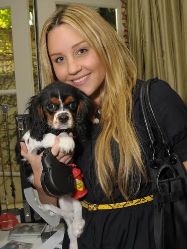 Amanda Bynes cuddles her puppy Charlie